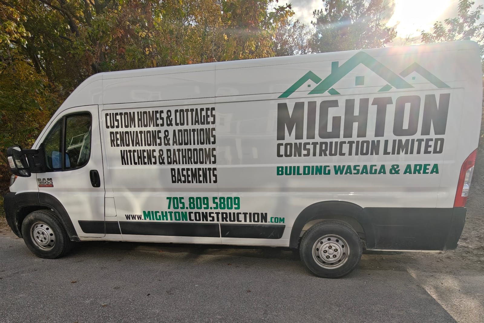 Mighton Construction Limited work van with Building Wasaga & Area lettering, parked on a South Georgian Bay job site