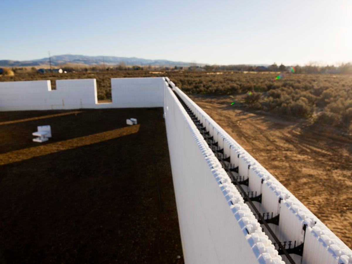 ICF wall installation detail by certified Mighton Construction crew in South Georgian Bay