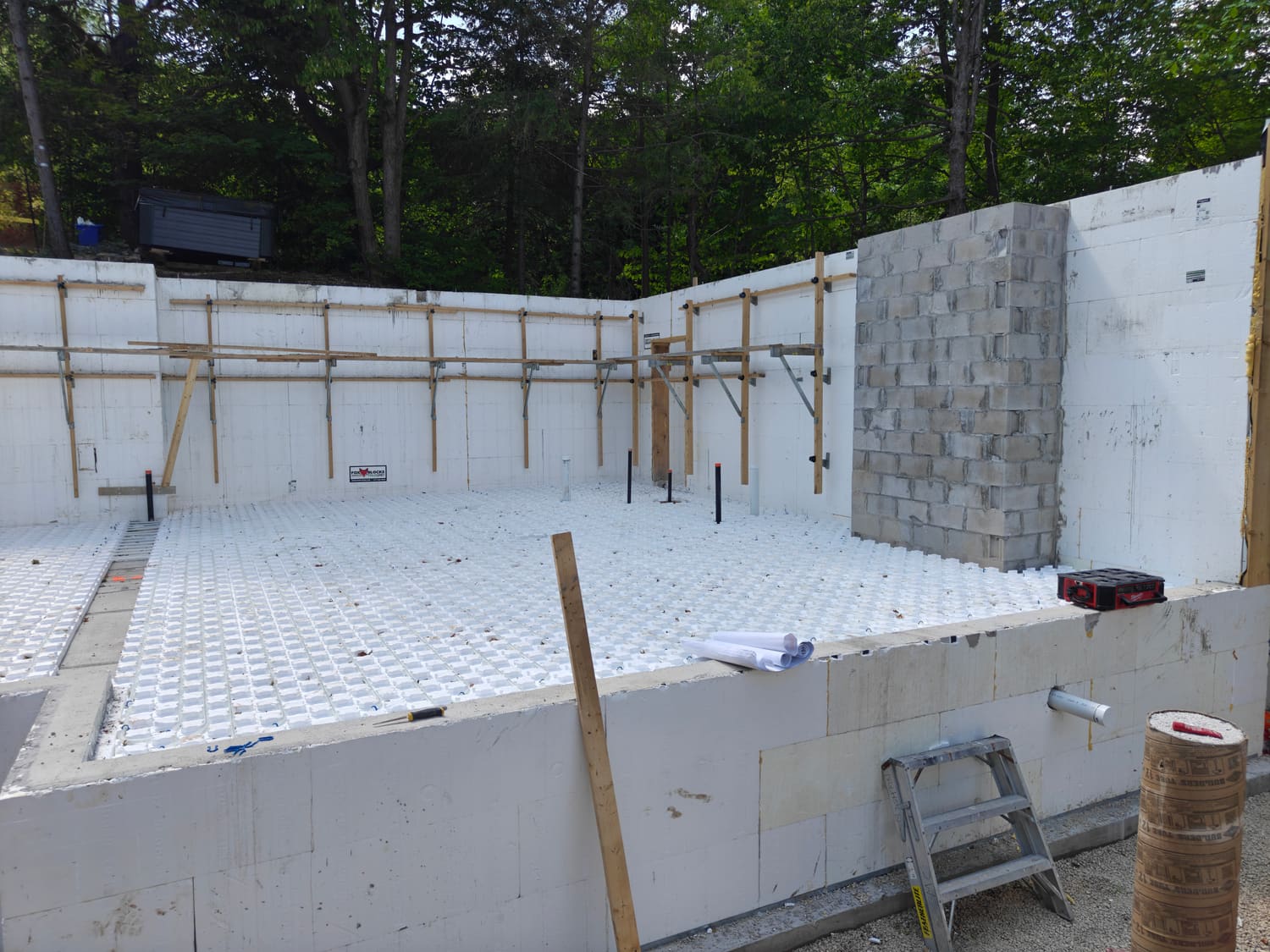 Insulated slab prep and ICF wall corner detail at 105 Orchard Lane in Clearview