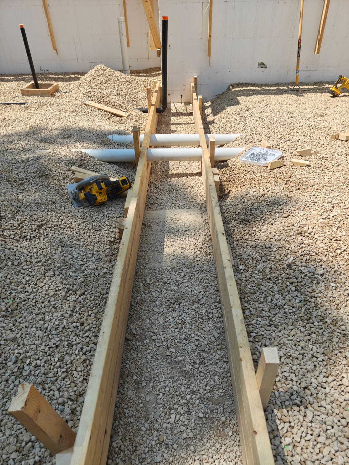 Trench with pipes set in the stone base at 105 Orchard Lane in Clearview