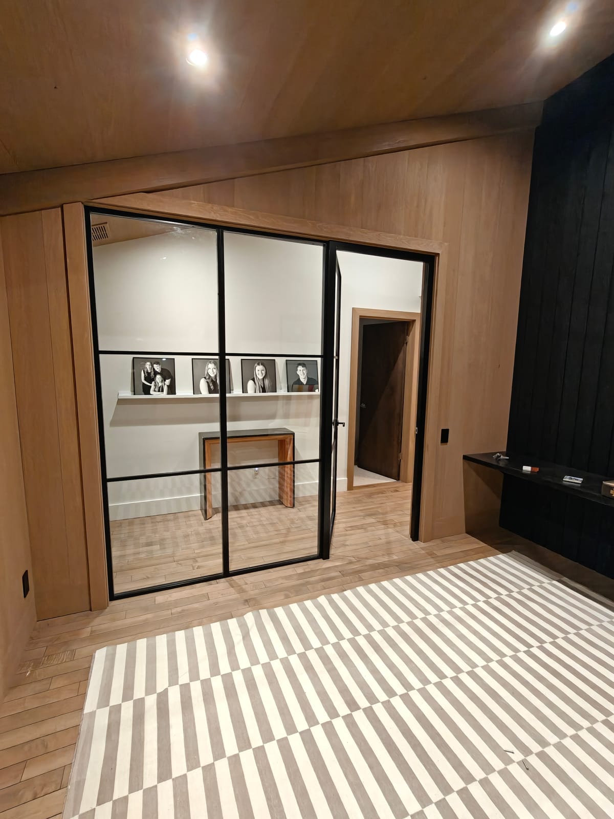 Office steel-and-glass door and built-in desk, 23 Forest Drive renovation in Collingwood