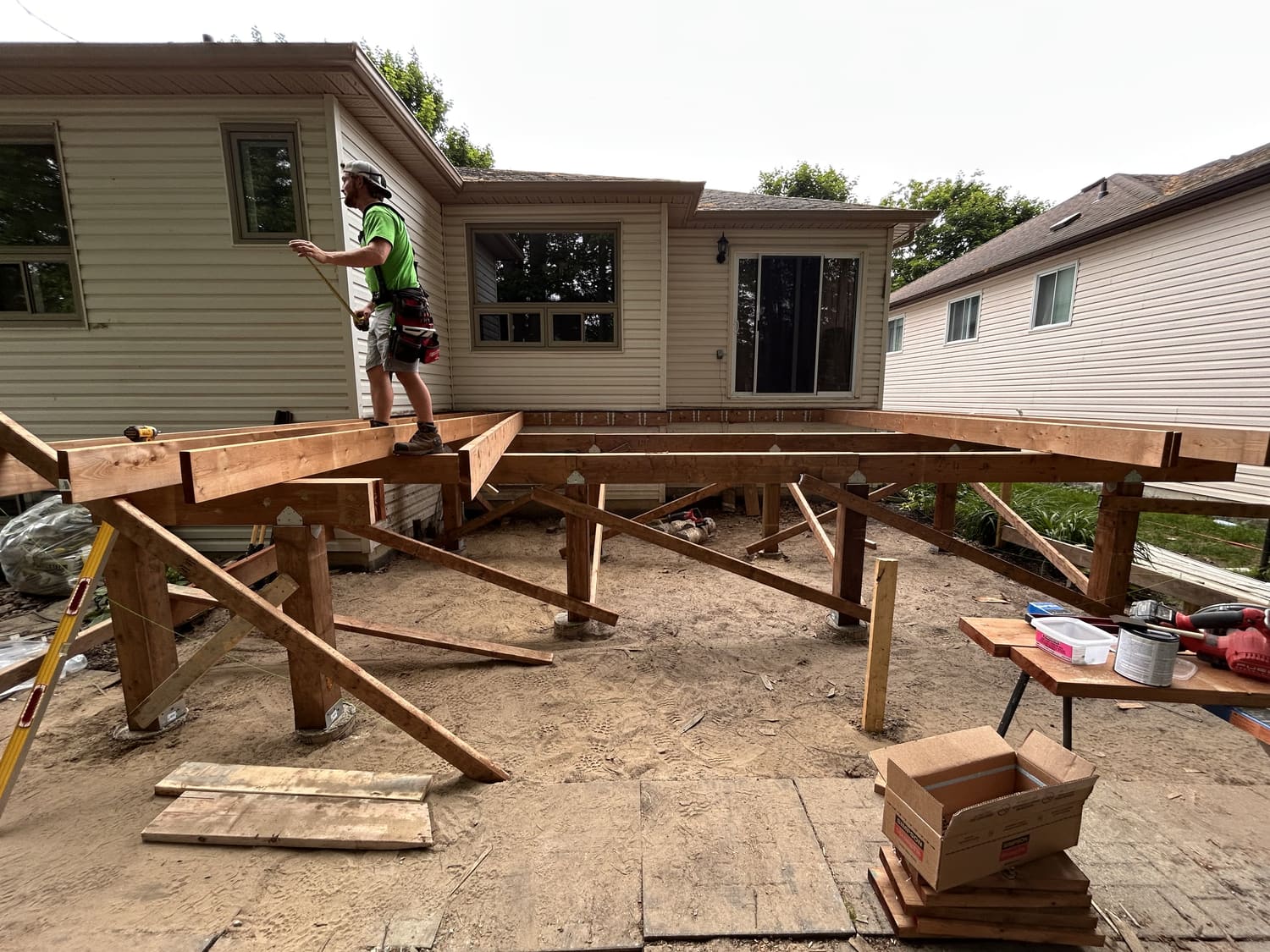 New deck framing with posts and beams being built by the Mighton Construction crew at 46 Timberland Cres, Wasaga Beach