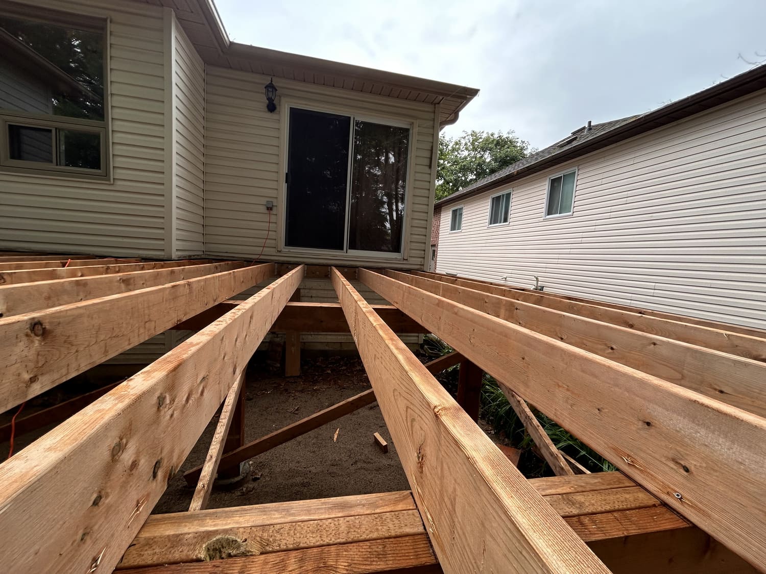New pressure-treated deck joists at 46 Timberland Cres in Wasaga Beach