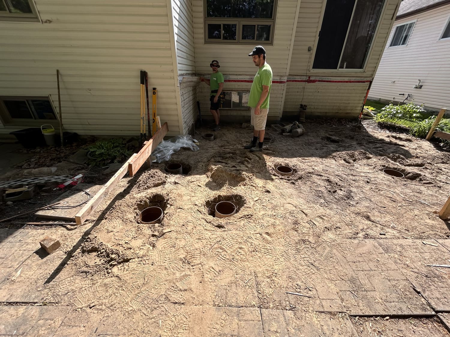 Footing holes dug for sonotube footings in the cleared area at 46 Timberland Cres, Wasaga Beach