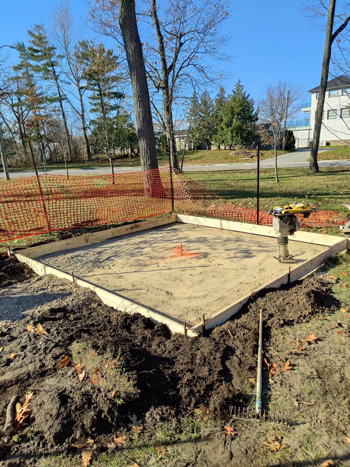 Formed concrete pad with compacted base and plate compactor for the Wasaga Beach Town Hall gazebo