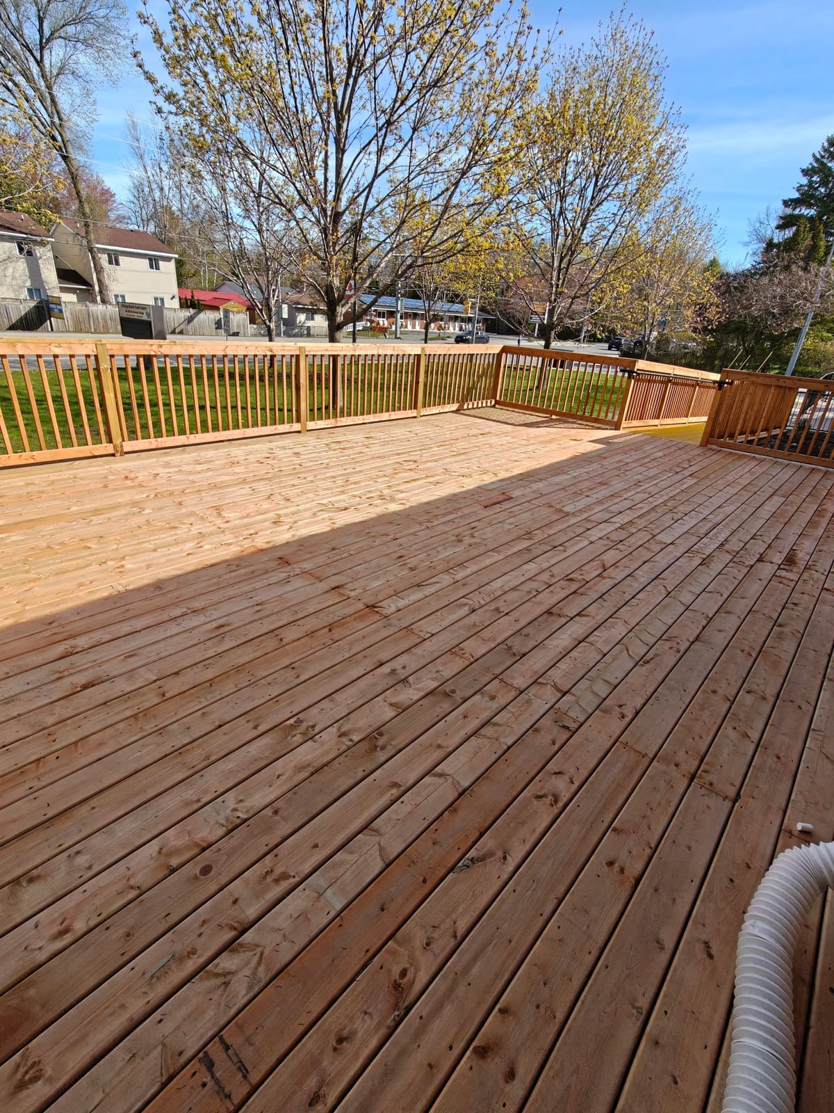 Deck surface and picket guardrail at the Wasaga Beach Youth Centre